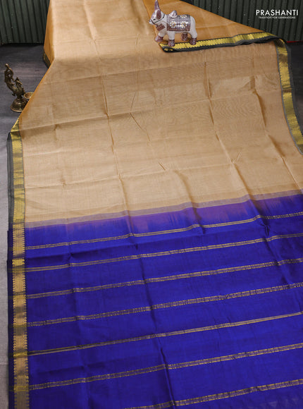 Silk cotton saree sandal and blue with plain body and zari woven border