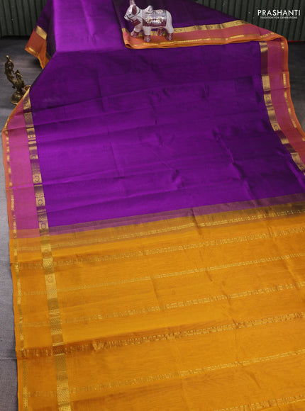 Silk cotton saree purple and mustard yellow with plain body and rettapet zari woven border