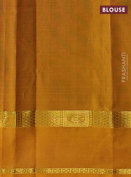 Silk cotton saree purple and mustard yellow with plain body and rettapet zari woven border