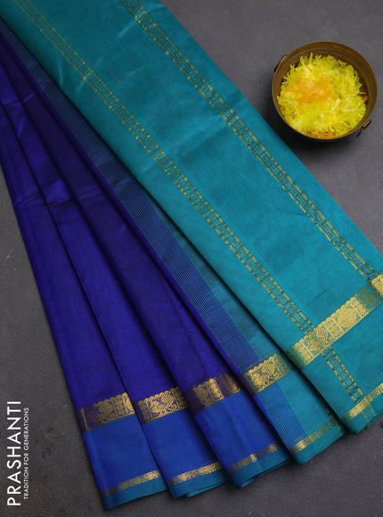 Silk cotton saree blue and teal green with plain body and rettapet zari woven border