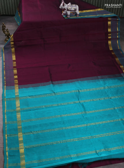 Silk cotton saree wine shade and teal green with plain body and rettapet zari woven border