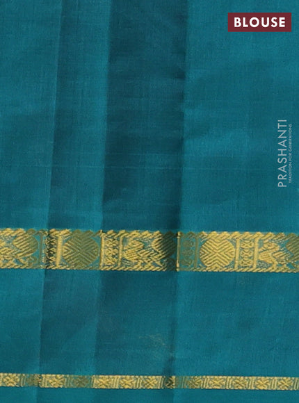 Silk cotton saree wine shade and teal green with plain body and rettapet zari woven border