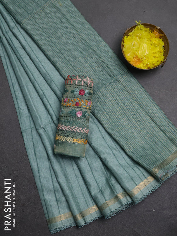 Matka silk saree teal green with allover stripe pattern and zari woven border
