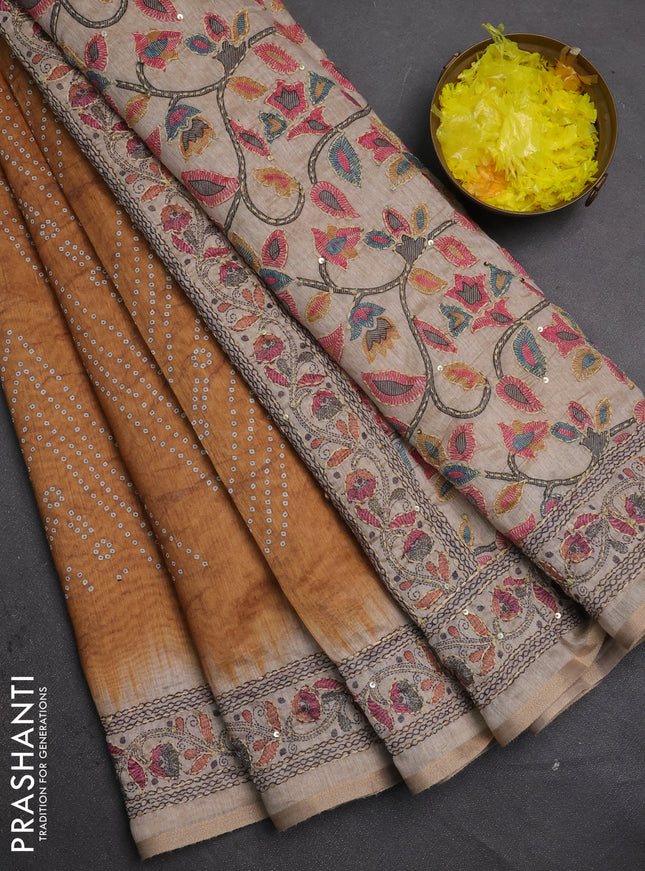 Semi linen saree dark mustard and beige with allover bandhani prints and embroidery pallu & border