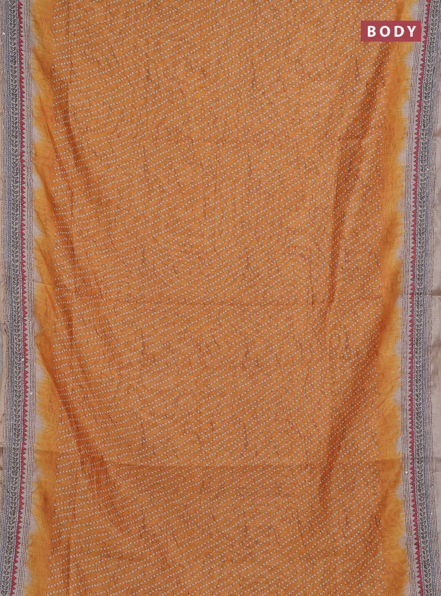 Semi linen saree mustard yellow and beige with allover bandhani prints and embroidery pallu & border