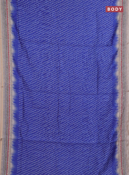 Semi linen saree blue and beige with allover bandhani prints and embroidery pallu & border