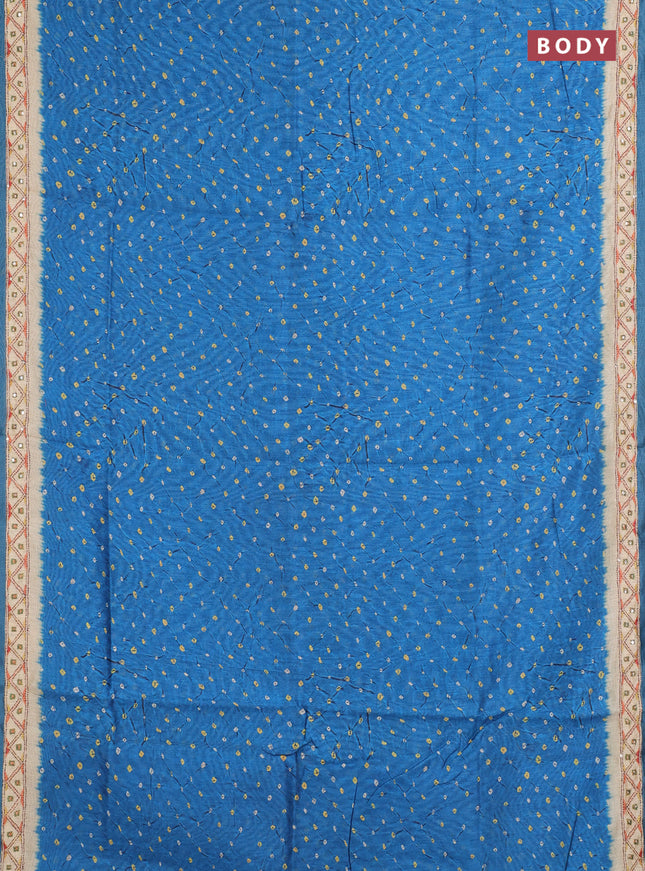Semi linen saree peacock blue and beige with allover bandhani prints and embroidery pallu & border