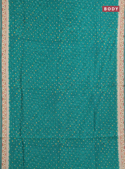 Semi linen saree green and beige with allover bandhani prints and embroidery pallu & border