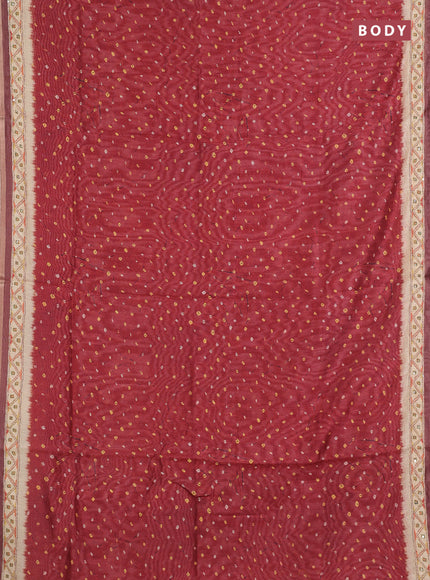 Semi linen saree maroon and beige with allover bandhani prints and embroidery pallu & border