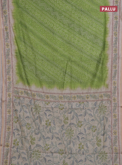 Semi linen saree light green and beige with allover bandhani prints and embroidery pallu & border