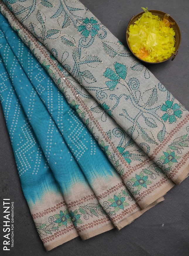 Semi linen saree cs blue and beige with allover bandhani prints and embroidery pallu & border