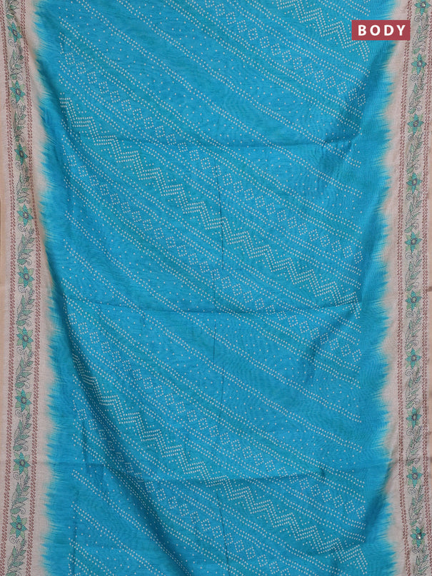 Semi linen saree cs blue and beige with allover bandhani prints and embroidery pallu & border