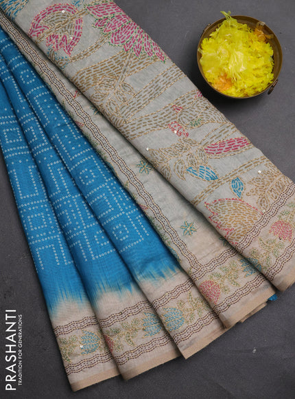 Semi linen saree cs blue and beige with allover bandhani prints and embroidery pallu & border