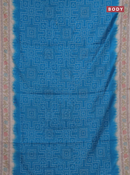 Semi linen saree cs blue and beige with allover bandhani prints and embroidery pallu & border