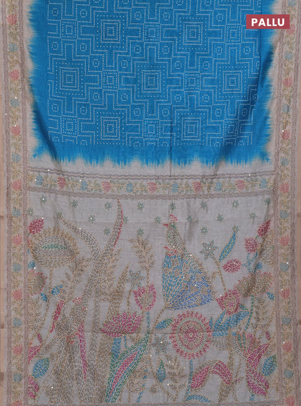 Semi linen saree cs blue and beige with allover bandhani prints and embroidery pallu & border