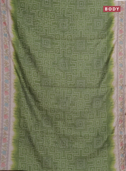 Semi linen saree light green and beige with allover bandhani prints and embroidery pallu & border