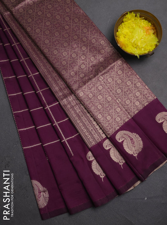 Semi soft silk saree deep purple with allover zari woven checked pattern and paisley zari woven butta border