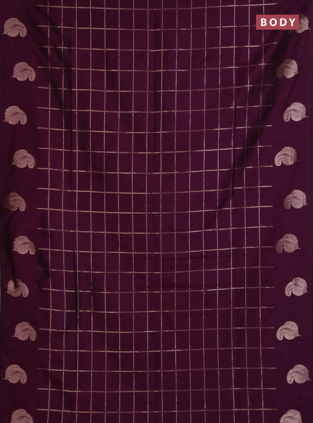 Semi soft silk saree deep purple with allover zari woven checked pattern and paisley zari woven butta border