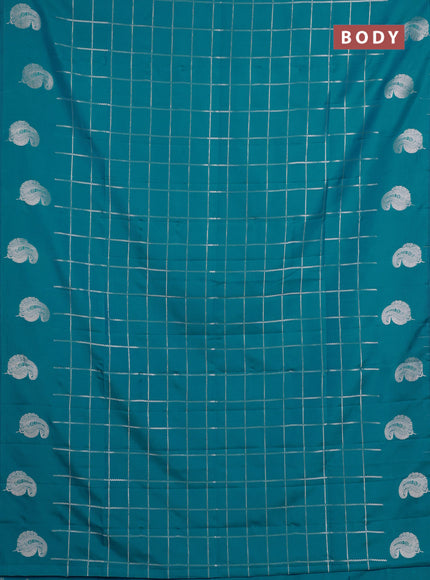 Semi soft silk saree teal blue with allover zari woven checked pattern and paisley zari woven butta border