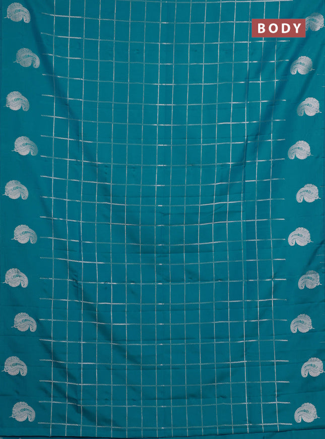 Semi soft silk saree teal blue with allover zari woven checked pattern and paisley zari woven butta border