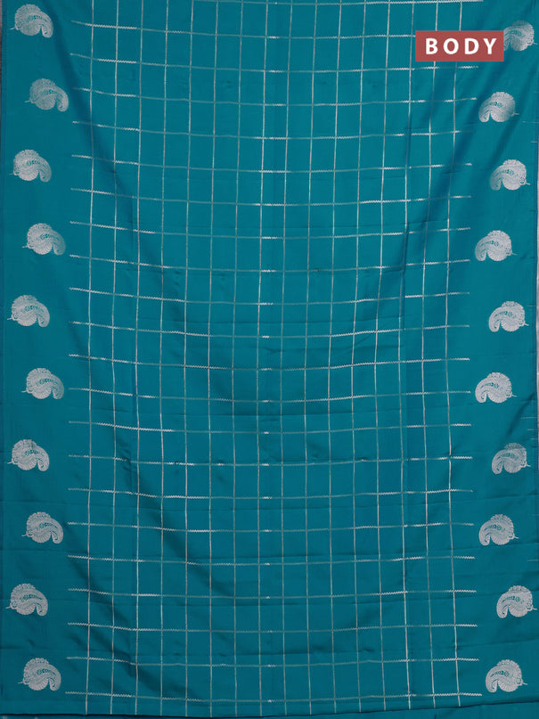 Semi soft silk saree teal blue with allover zari woven checked pattern and paisley zari woven butta border