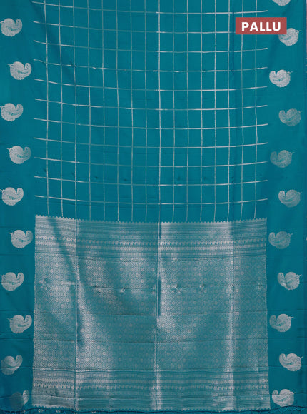 Semi soft silk saree teal blue with allover zari woven checked pattern and paisley zari woven butta border
