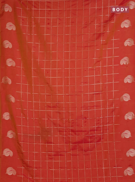 Semi soft silk saree sunset orange with allover zari woven checked pattern and paisley zari woven butta border