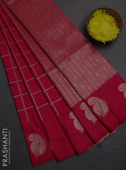 Semi soft silk saree tomato pink with allover zari woven checked pattern and paisley zari woven butta border