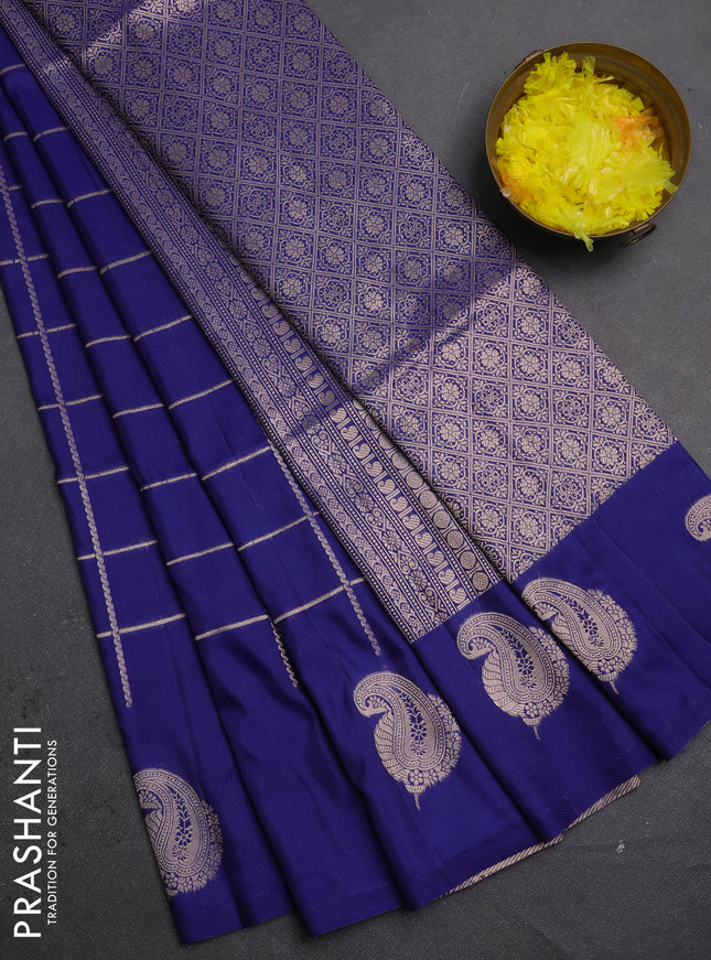 Semi soft silk saree navy blue with allover zari woven checked pattern and paisley zari woven butta border
