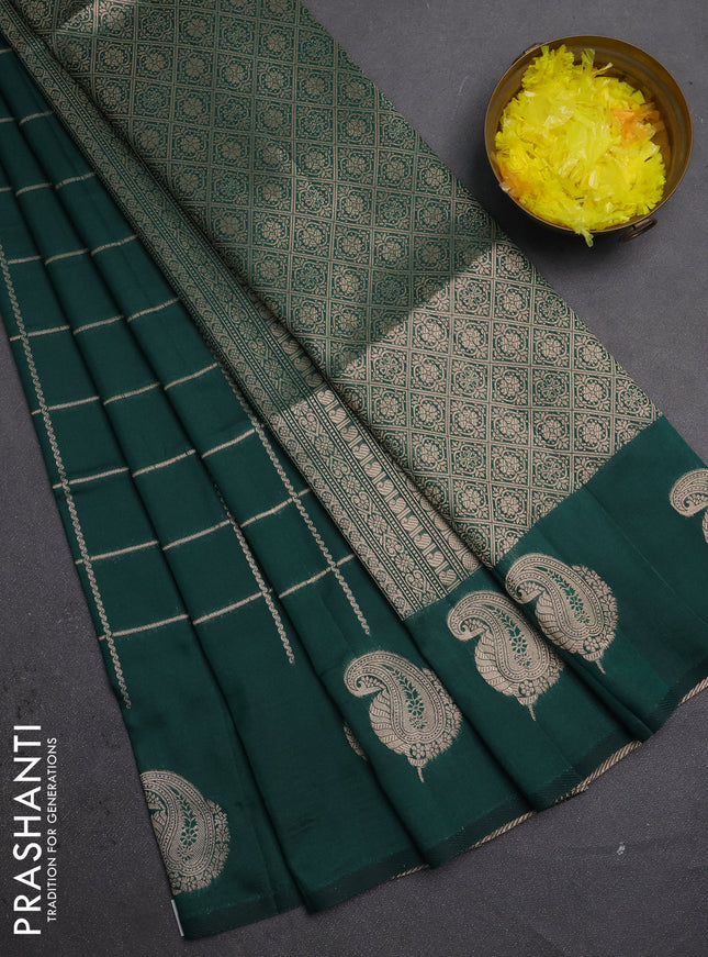 Semi soft silk saree bottle green with allover zari woven checked pattern and paisley zari woven butta border