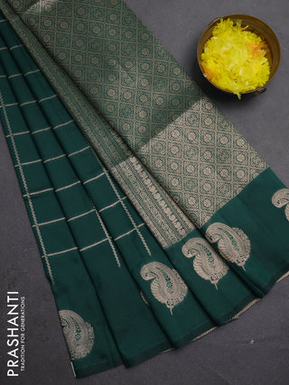 Semi soft silk saree bottle green with allover zari woven checked pattern and paisley zari woven butta border