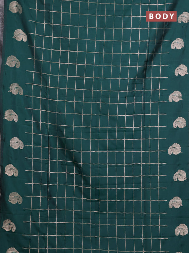 Semi soft silk saree bottle green with allover zari woven checked pattern and paisley zari woven butta border