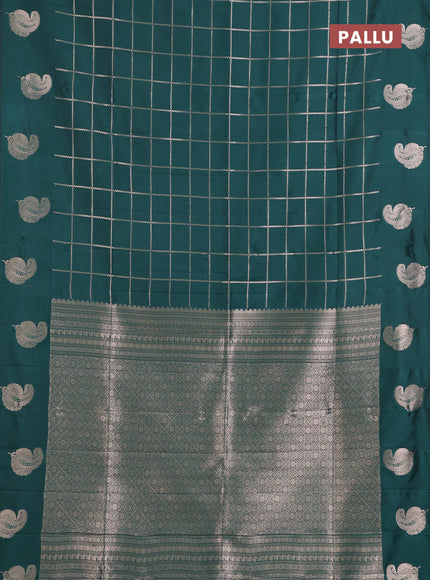 Semi soft silk saree bottle green with allover zari woven checked pattern and paisley zari woven butta border