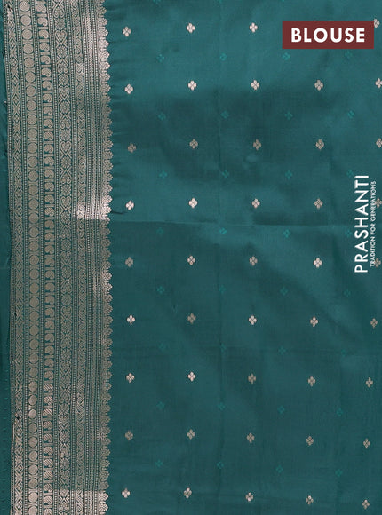 Semi soft silk saree bottle green with allover zari woven checked pattern and paisley zari woven butta border