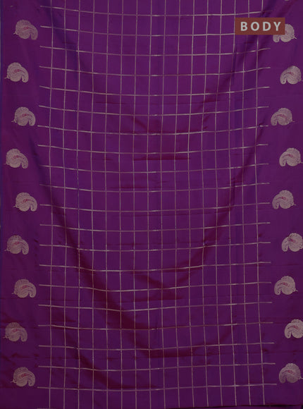 Semi soft silk saree purple with allover zari woven checked pattern and paisley zari woven butta border