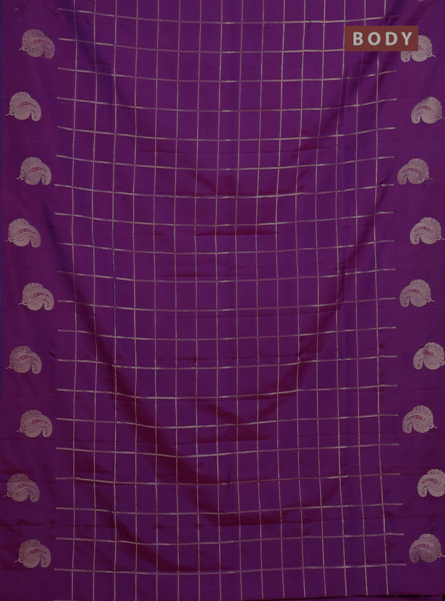 Semi soft silk saree purple with allover zari woven checked pattern and paisley zari woven butta border