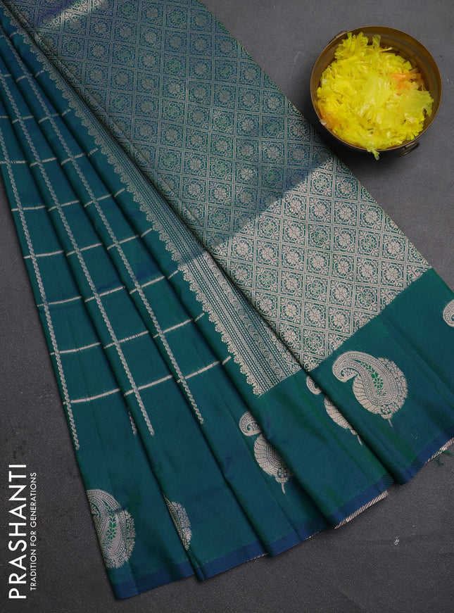 Semi soft silk saree peacock green with allover zari woven checked pattern and paisley zari woven butta border