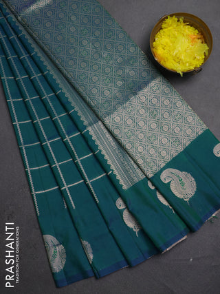 Semi soft silk saree peacock green with allover zari woven checked pattern and paisley zari woven butta border