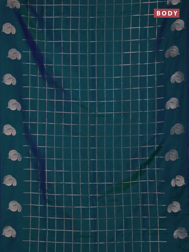 Semi soft silk saree peacock green with allover zari woven checked pattern and paisley zari woven butta border