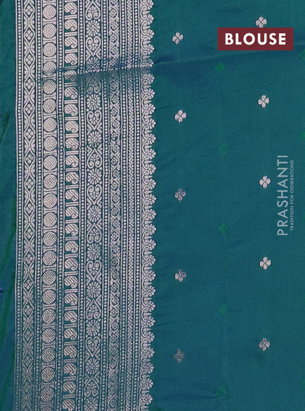 Semi soft silk saree peacock green with allover zari woven checked pattern and paisley zari woven butta border