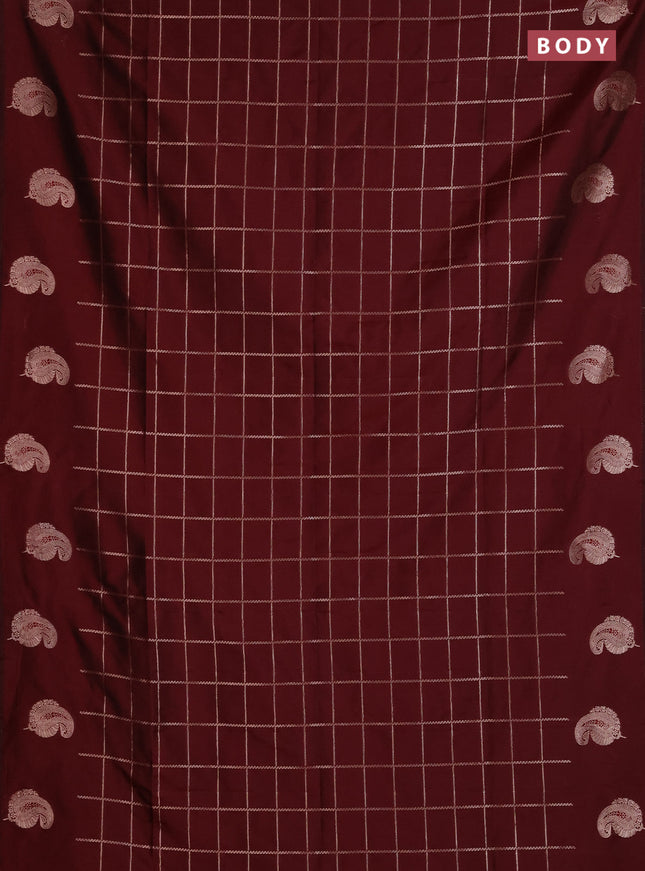 Semi soft silk saree maroon with allover zari woven checked pattern and paisley zari woven butta border