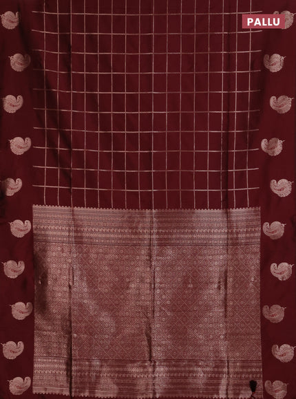 Semi soft silk saree maroon with allover zari woven checked pattern and paisley zari woven butta border