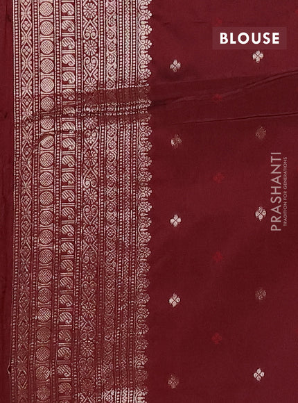 Semi soft silk saree maroon with allover zari woven checked pattern and paisley zari woven butta border