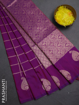 Semi soft silk saree purple with allover zari woven checked pattern and paisley zari woven butta border