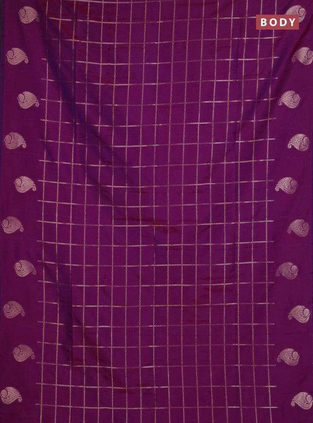 Semi soft silk saree purple with allover zari woven checked pattern and paisley zari woven butta border