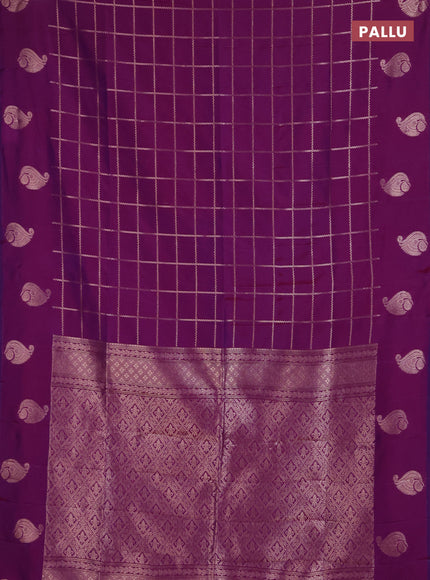 Semi soft silk saree purple with allover zari woven checked pattern and paisley zari woven butta border