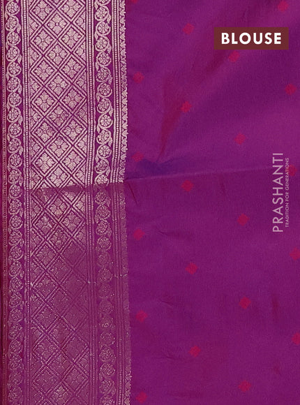 Semi soft silk saree purple with allover zari woven checked pattern and paisley zari woven butta border