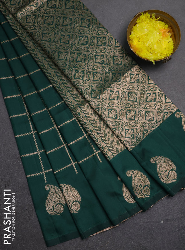 Semi soft silk saree bottle green with allover zari woven checked pattern and paisley zari woven butta border