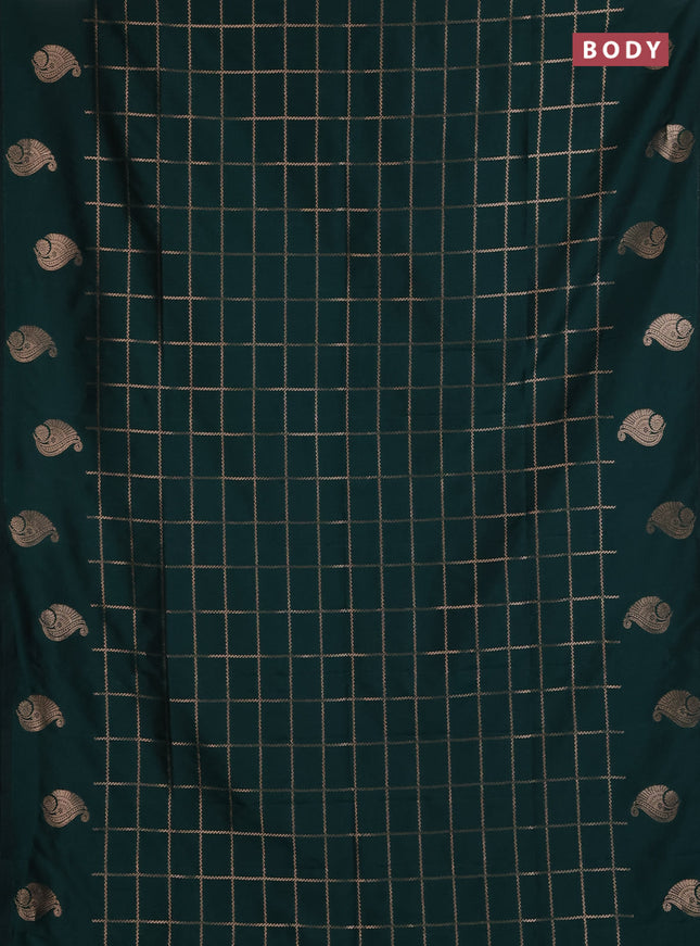 Semi soft silk saree bottle green with allover zari woven checked pattern and paisley zari woven butta border