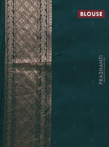 Semi soft silk saree bottle green with allover zari woven checked pattern and paisley zari woven butta border